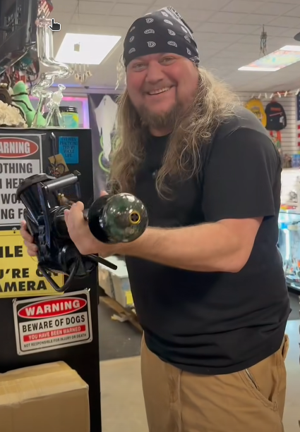 Photo of Swap Meet J Owners and a funny social media clip